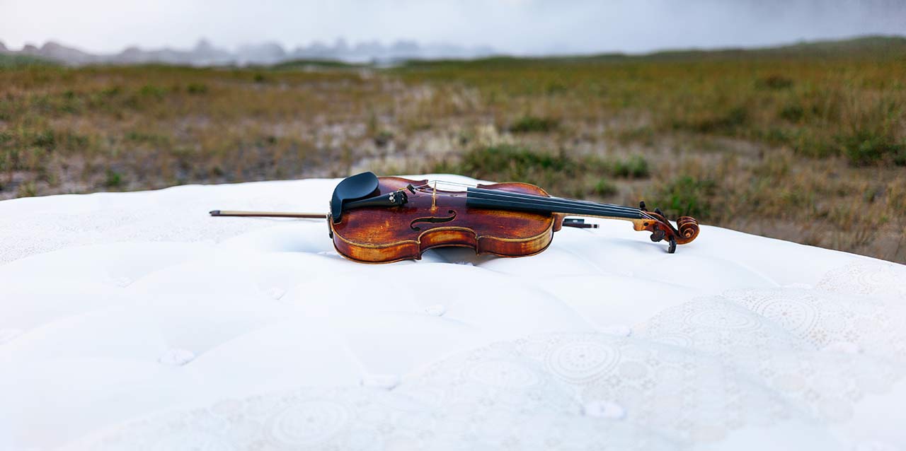 violino sobre colchão